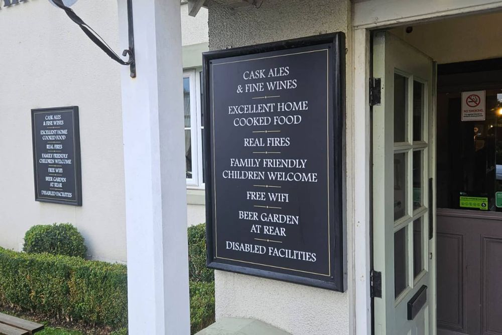 The Dog and Partridge - entrance sign digitally printed vinyl graphics with protective laminate to face mounted onto aluminium composite