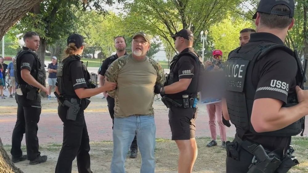 Jan Carey, 54, of North Carolina, said he was protesting an executive order from President Donald Trump attempting to ban flag burning