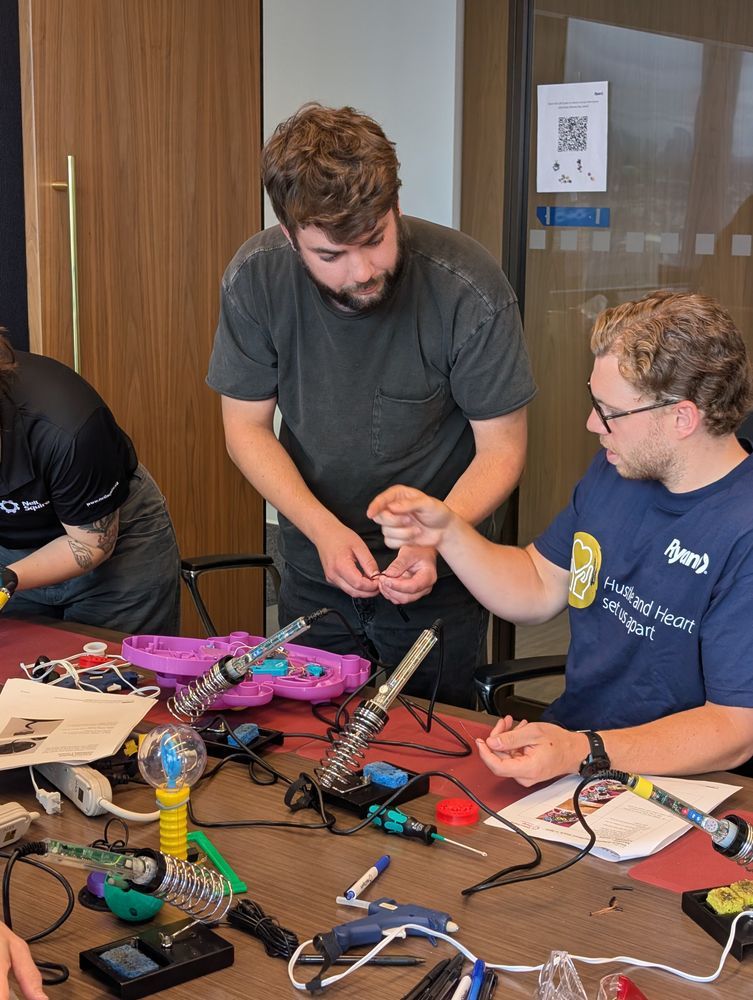 Ryan Vancouver team members work together at a build event.