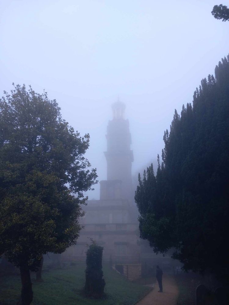 Tower surrounded by mist