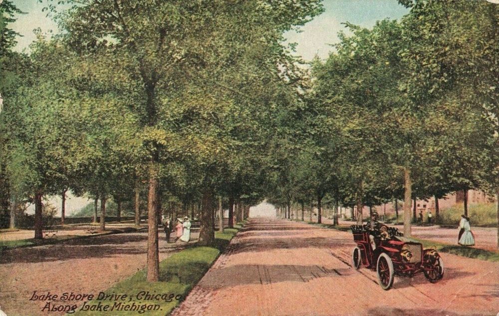 Lake Shore Drive, Chicago
Undated postcard, Circa 1905
Tree-lined dirt roads with one auto and groups of people walking. 

No. 406 Published by Franklin Post Card Co., Chicago, Illinois