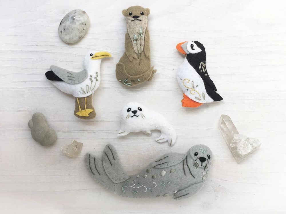 This 7 page PDF pattern download will give you instructions, templates and embroidery patterns to make the creatures pictured, Otter, Seal mama and baby, Seagull and Puffin.