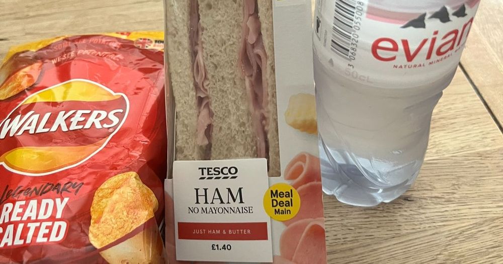 Ham sandwich, ready salted crisps and bottled water.