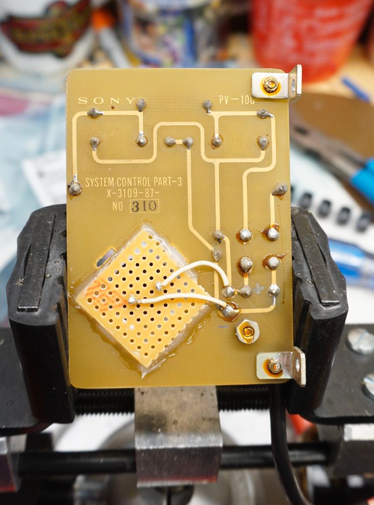 The underside now with a small section of perf board glued on.