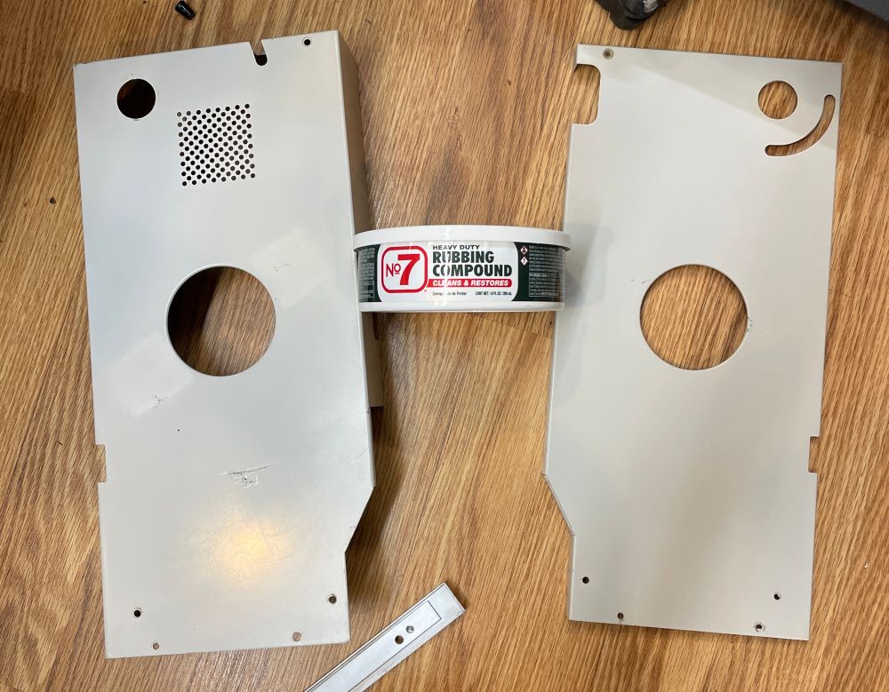 The metal covers that go behind the reels looking all nice and clean with a tub of no. 7 rubbing compound in between them.