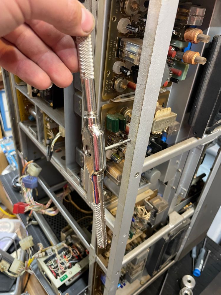 Me tapping the frame rail of the PV-100