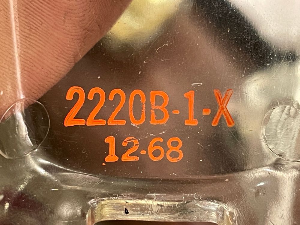 The marking on the clear housing showing the date of manufacture and the “X” for eXperimental i.e. lab use only
