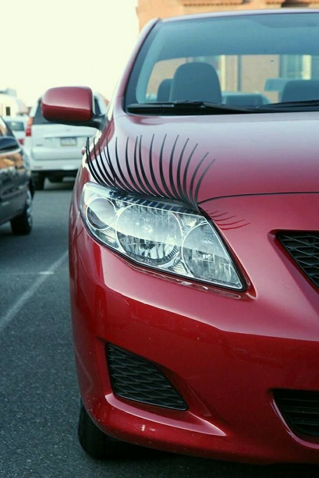 Closeup of a front car with eyelashes