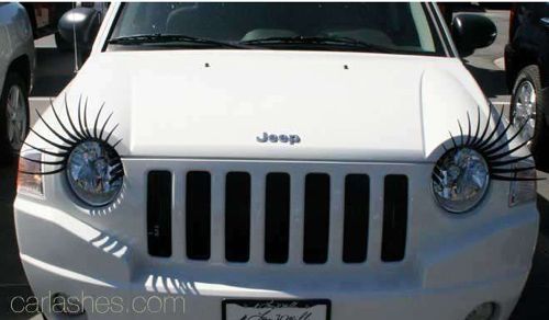 a cute white jeep, with beautiful ... headlight lashes