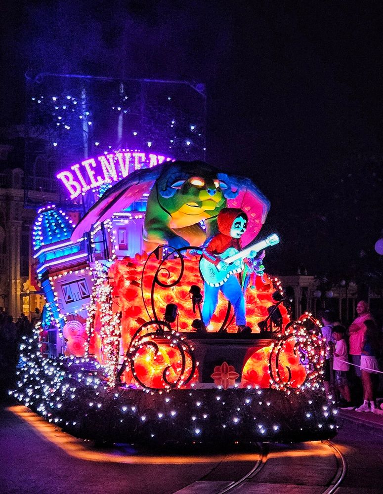 Disney Starlight parade at Magic Kingdom featuring Miguel on the Coco float 