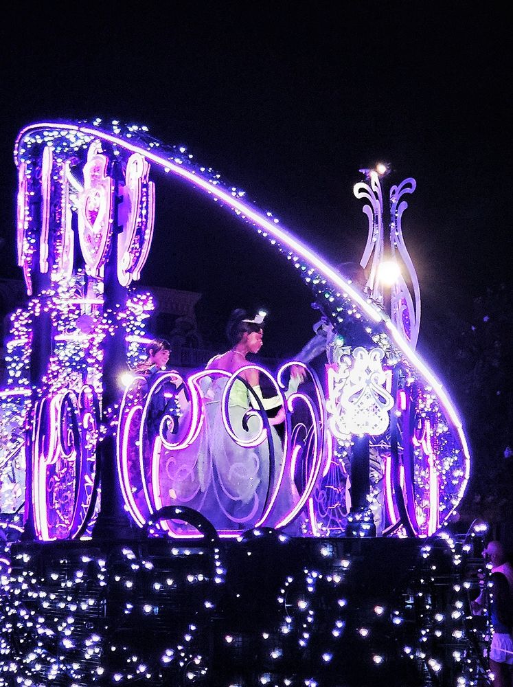 Disney Starlight parade at Magic Kingdom featuring Princess Tiana on the Princess float