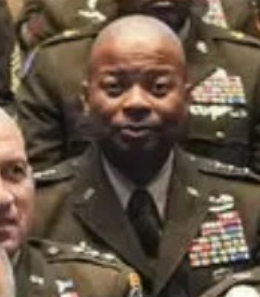 a three-star smirk for the ages breaking the fourth wall. you just know he knew when that shutter was going to click