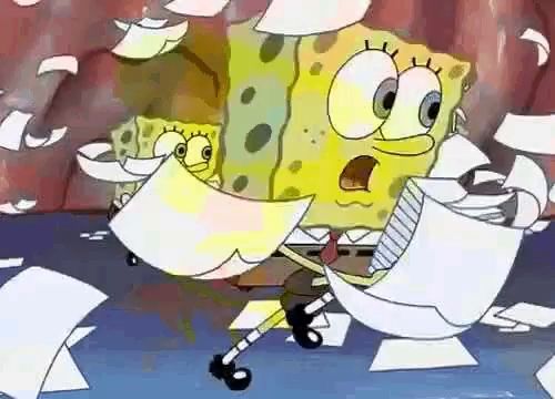 spongebob squarepants is holding a piece of paper in his hand while standing next to a pile of papers .