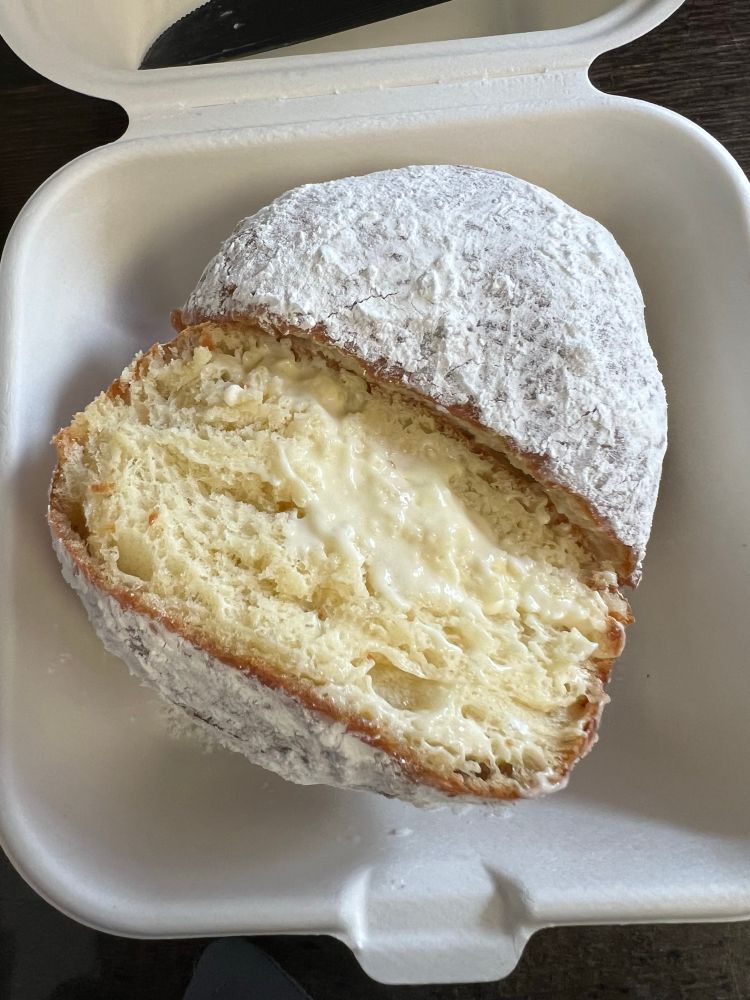 Cross section of a lemon cream filled donut