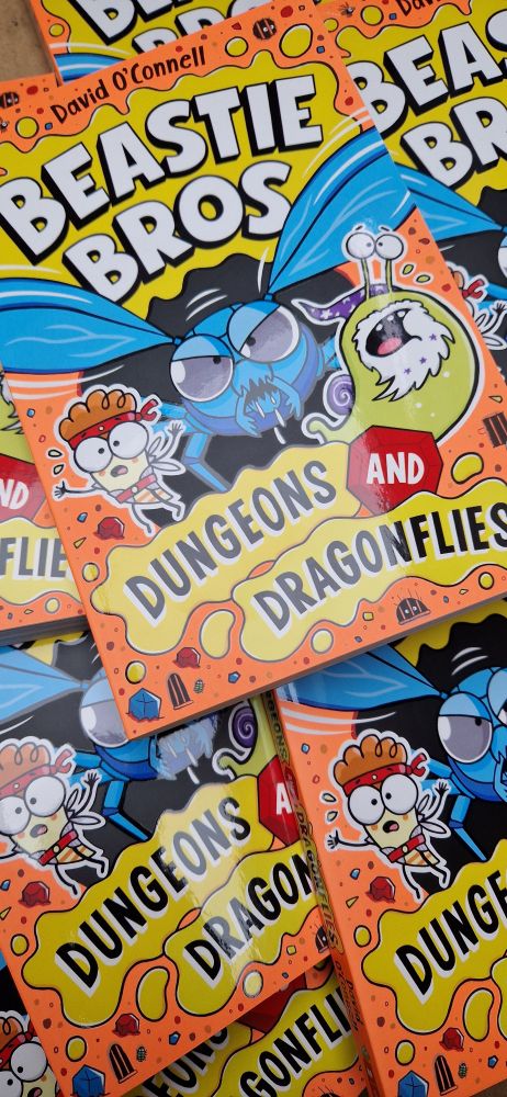 The cover of Beastie Bros: Dungeons and Dragonflies, featuring Dribble the snail and Dash the firefly.