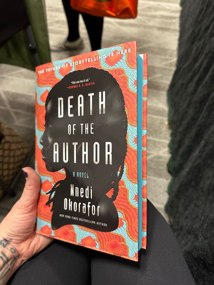 Hardcover book with turquoise sprayed edges: Death of the Author by Nnedi Okorafor