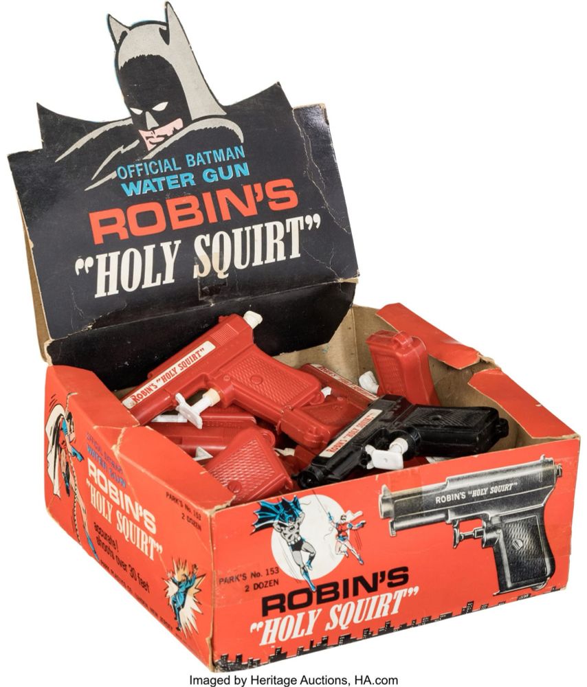 Image of vintage Batman Water Pistol toy display which reads “Robin’s Holy Squirt”