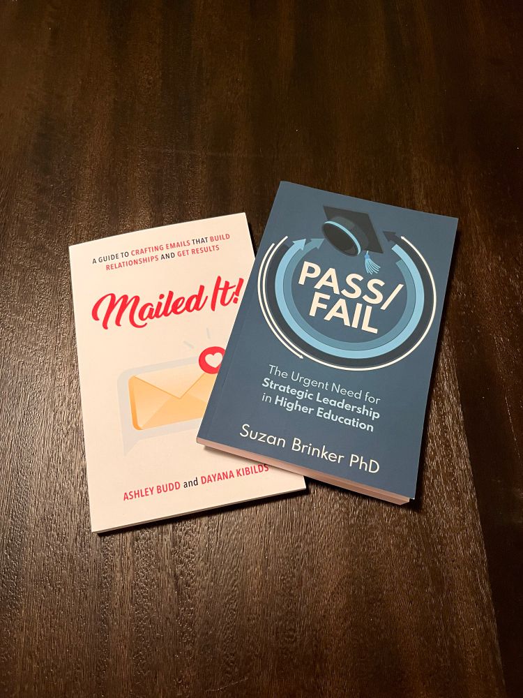 Photo of two books: Mailed It by Ashley Budd and Dayana Kibilds and Pass/Fail by Suzan Bricker PhD