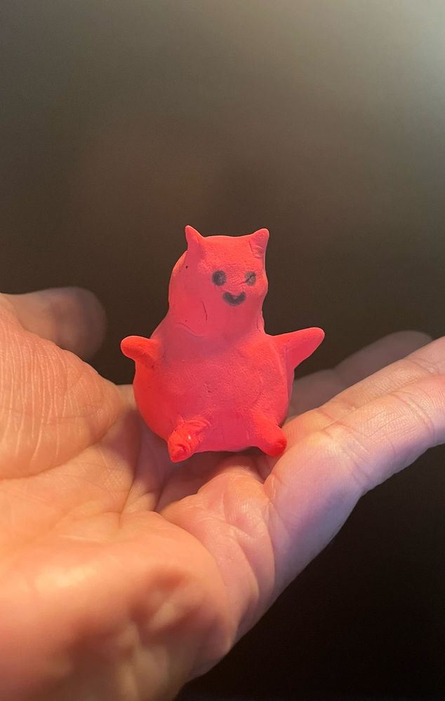 small eva dough figure of a cartoon demon