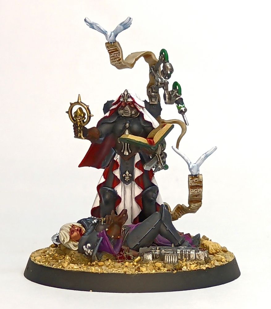 An Hospitaller from the Order of Our Martyred Lady seconded to the Adamant Heart. She is ministering to an injured sister of the latter Order while doves carry holy scripture past them both. Not a particularly efficient method of information transport, in my opinion. 