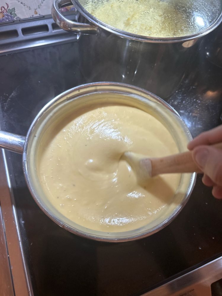 Adding cubbed cheese 