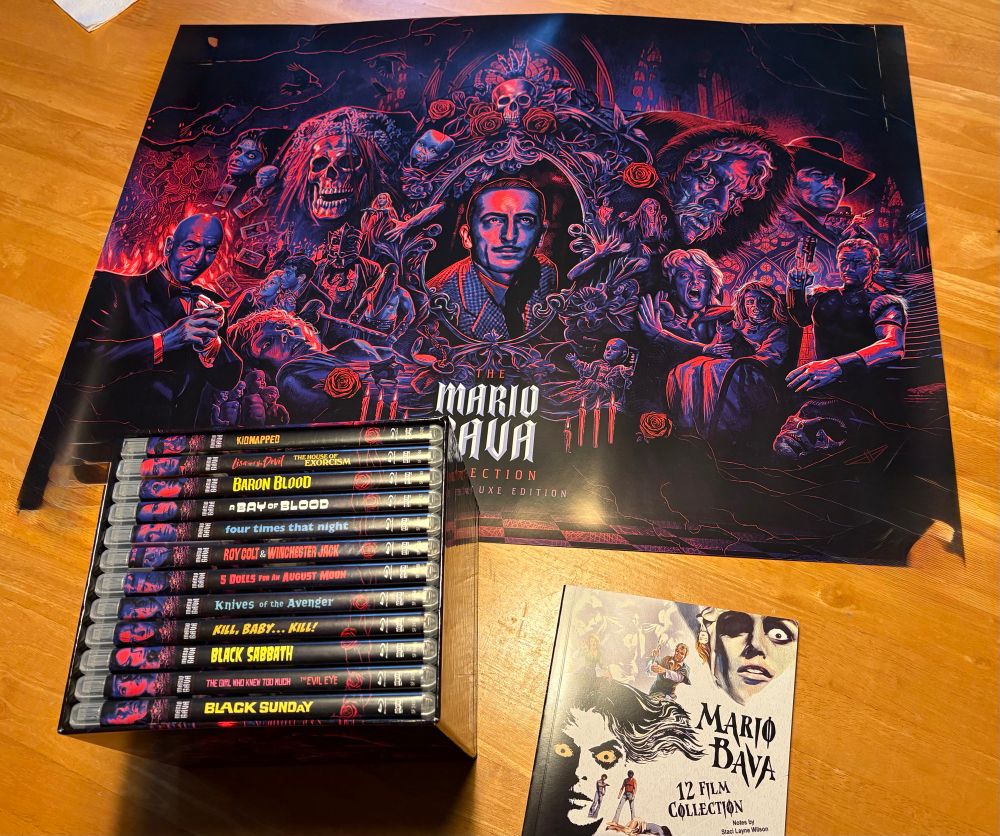 Picture showing a box set of 13 films directed by Mario Bava, and its accompanying poster and booklet. 