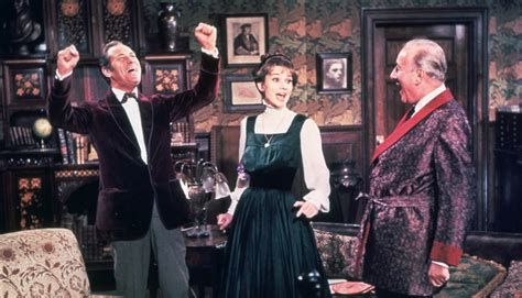 Rex Harrison, Audrey Hepburn, and Wilfred Hyde-White as Colonel Hugh Pickering all seem quite pleased with themselves.