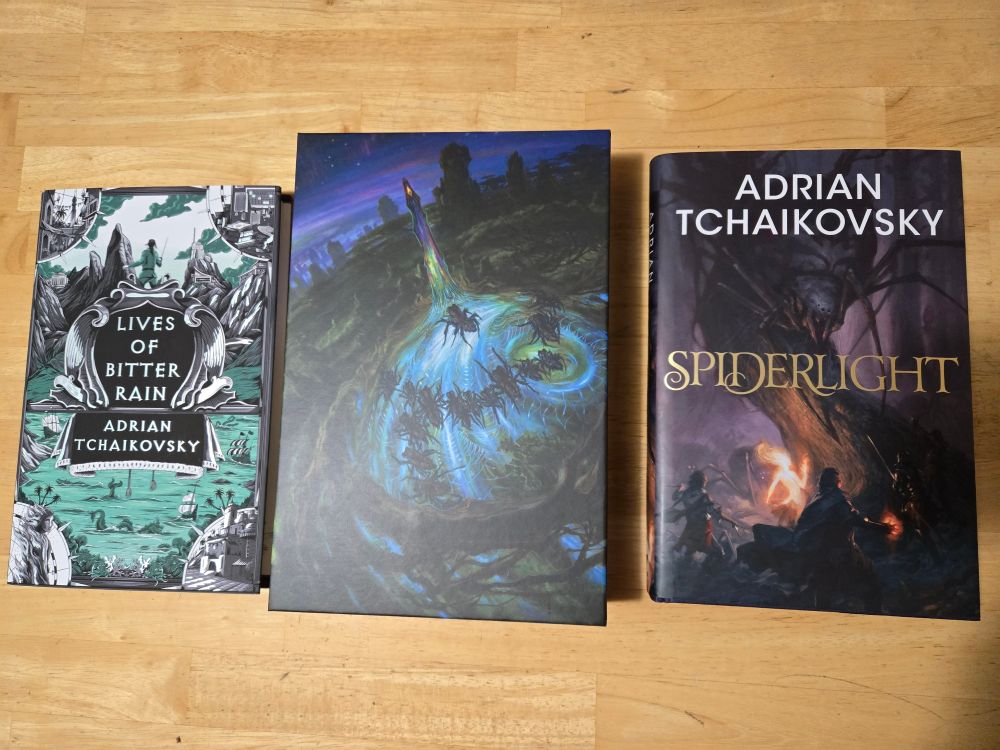 3 titles by Adrian Tchaikovsky- Lives of Bitter Rain novella, Children of Time Deluxe edition and Broken Binding edition of Spiderlight