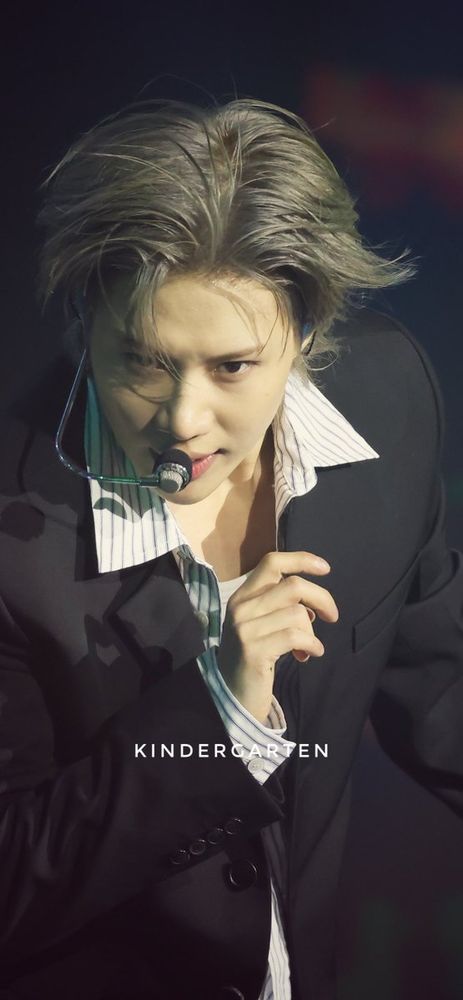 taemin death stare wild hair and suit. photo by kindergarten 