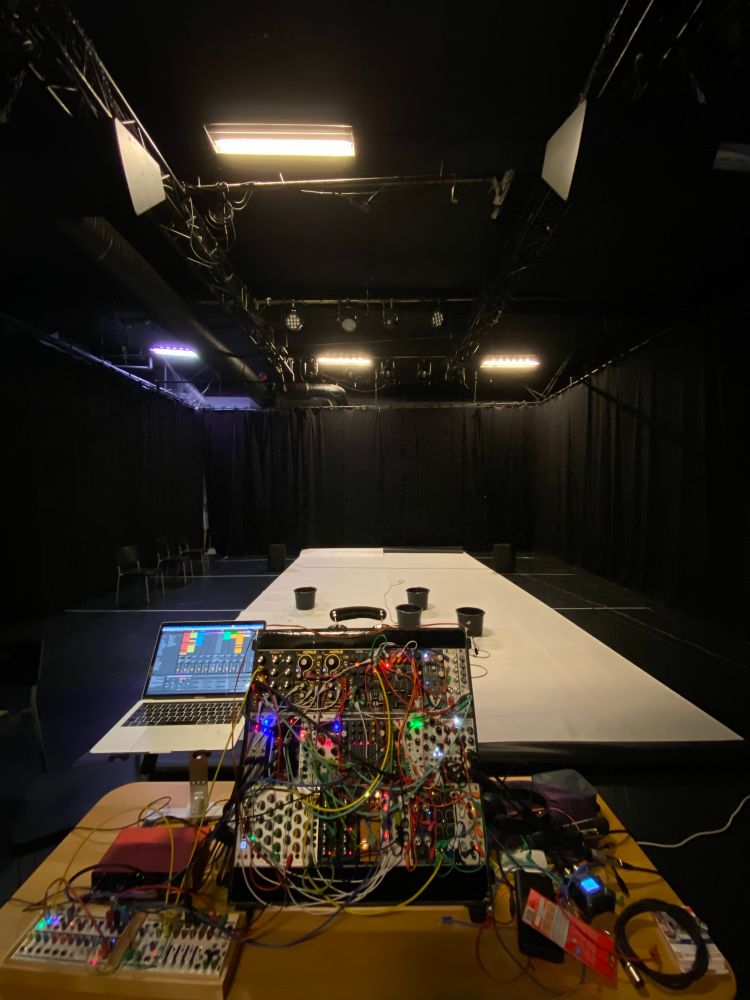 A black box with a modular synth. 