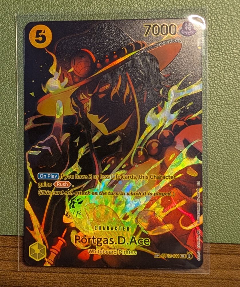 Special (SP) version alt art of ST13 Portgas D. Ace from OP12. 