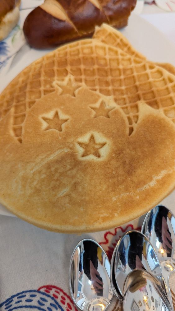 A stack of waffles with a 4 star dragon ball design on them.