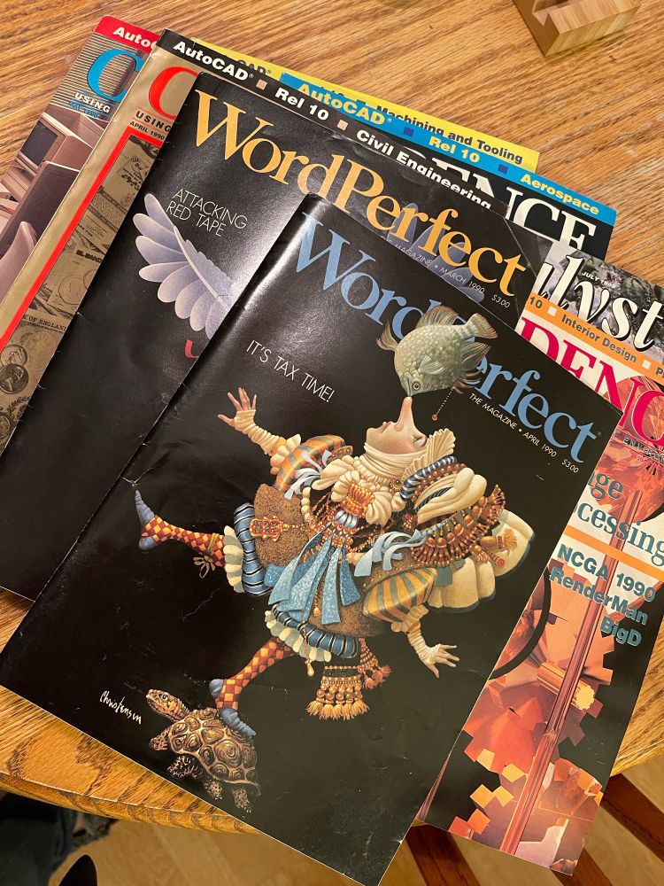 An assortment of CAD and WordPerfect magazines from 1990
