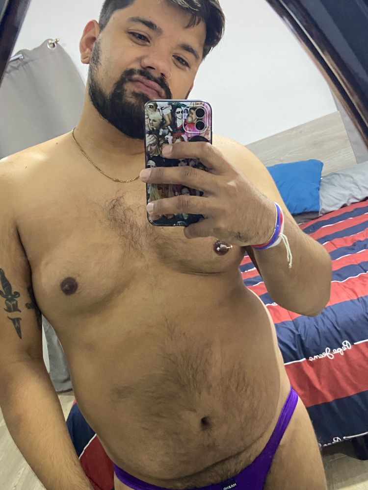 Chubby guy with a purple thong