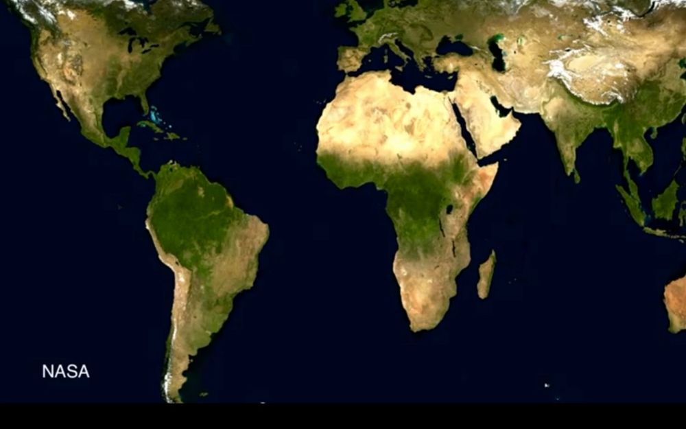 Photo is a flattened NASA image of the earth showing growing desert zones.
