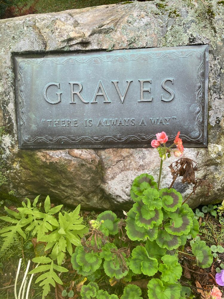 A tombstone that reads “Graves. There is always a way.”