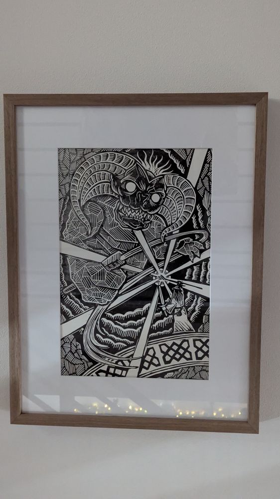 A framed linocut of Gandalf and the Balrog