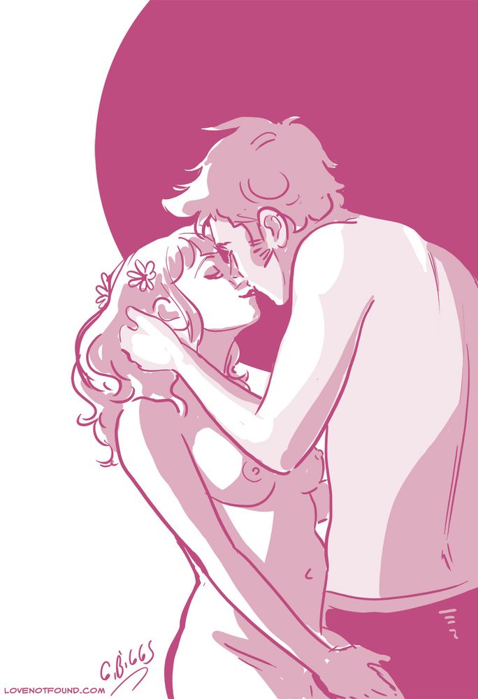 A couple kissing in the morning light.