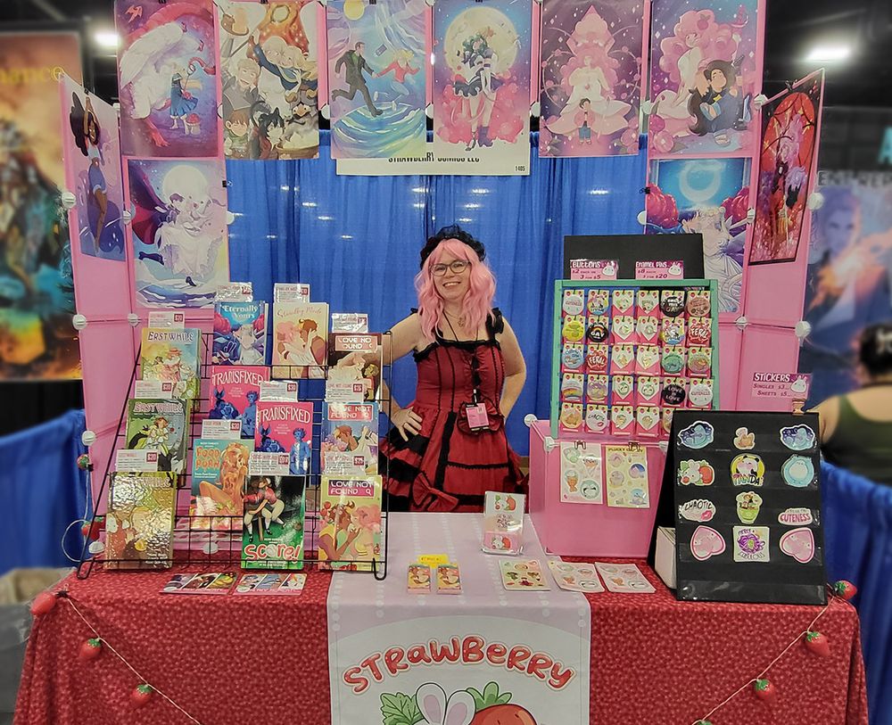 Gina Biggs in costume at her booth at SuperCon 2025