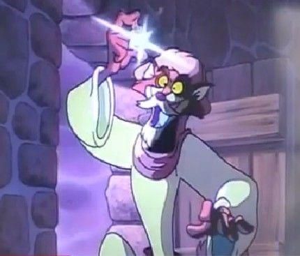 Alejandro holds aloft a shiny object in front of a door in his tall brick tower