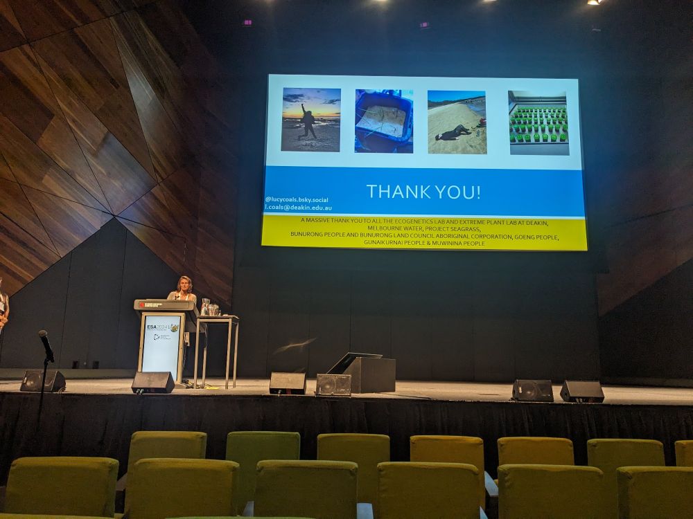 Lucy coals presenting on stage at ESA2024