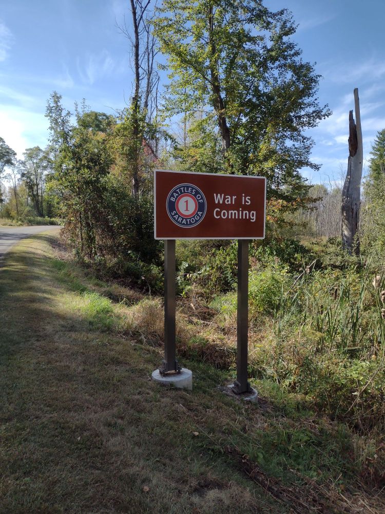 Sign for the first stop: War is Coming.