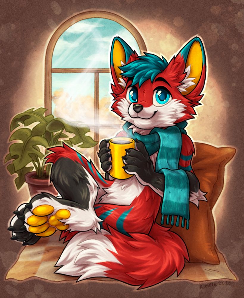 A fox sitting on a pillow with a cup of steaming hot coffee wearing a scarf. 