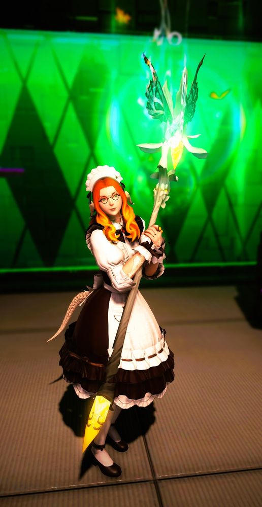 Lucy the small ginger Au Ra brandishes her Fae's Crown Cane while dressed as a maid

You'd think I'd have a better picture of it wouldn't you? It is beautiful though, as is the DNC weapon too