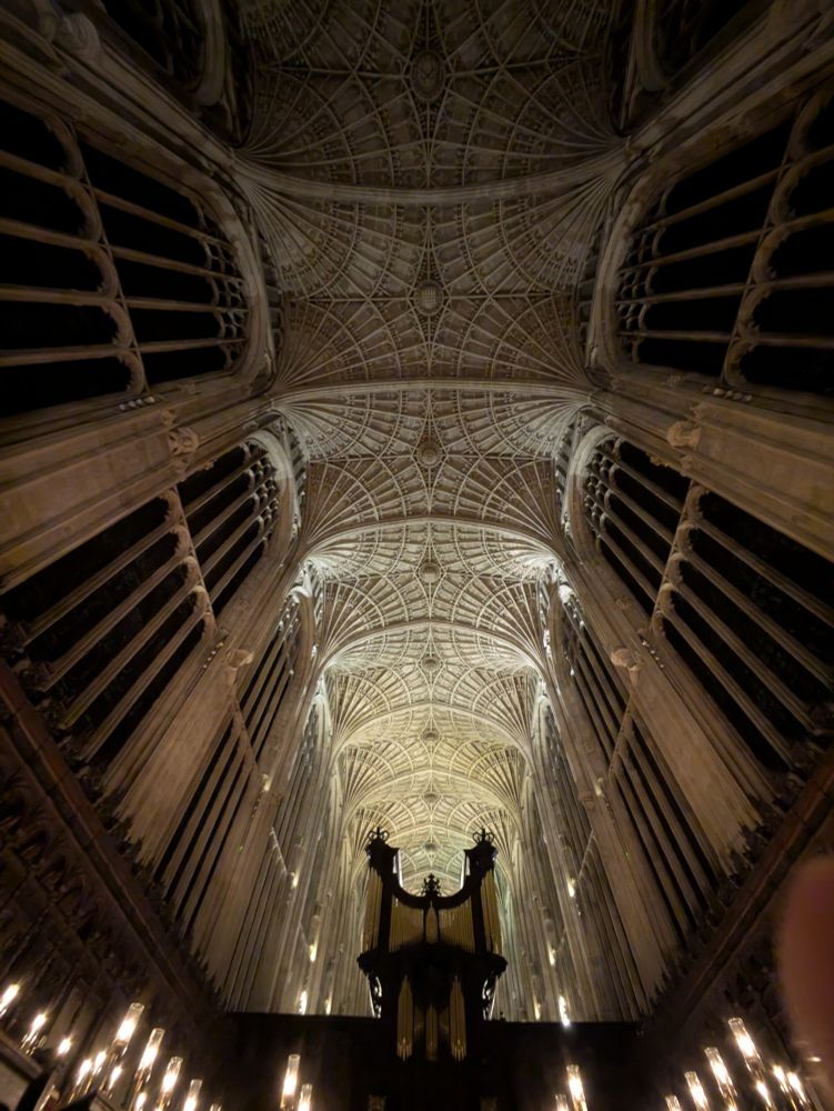 The ceiling of King's College Chapel in candlelight. 