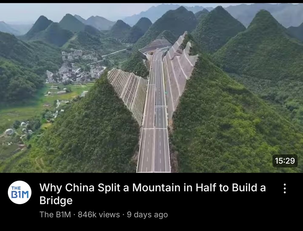 a thumbnail for the video by the b1m: Why China Split a Mountain in Half to Build a Bridge showing a mountain split in half by a motorway