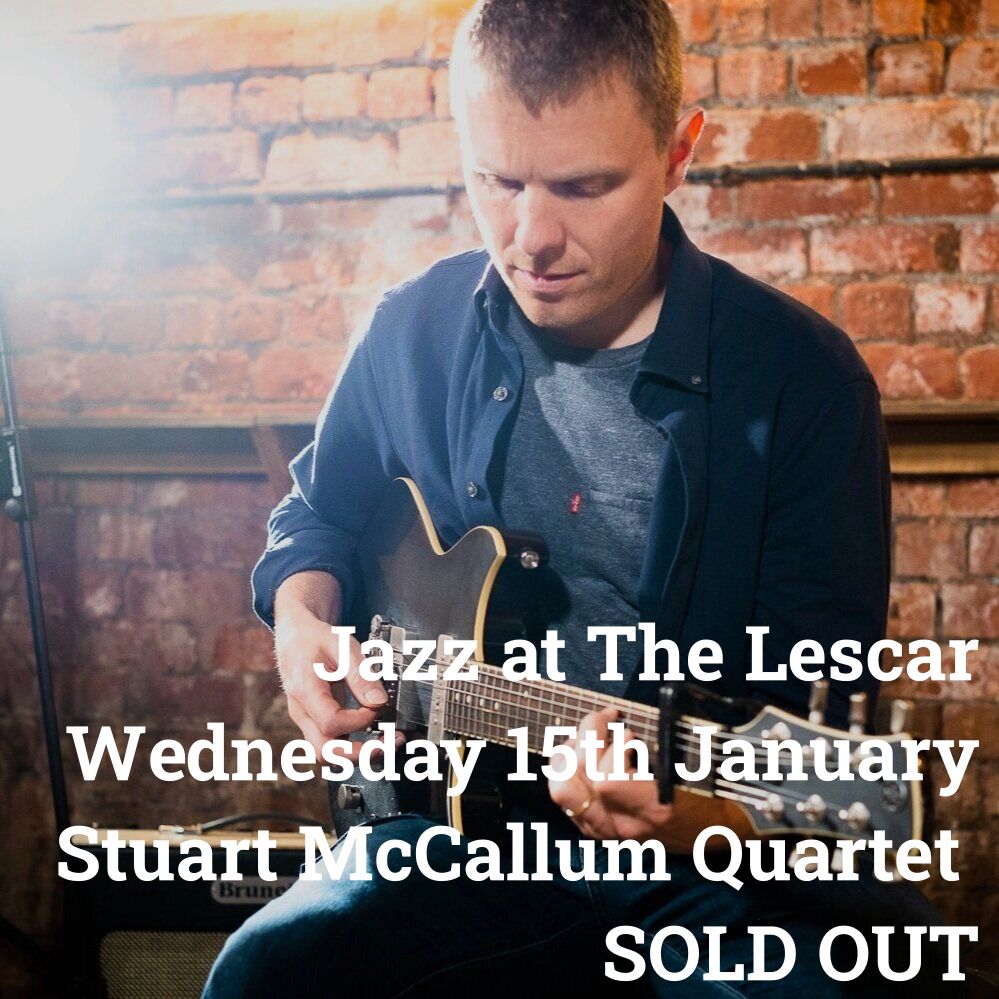 Gig poster for Stuart McCallum showing him playing his guitar. 