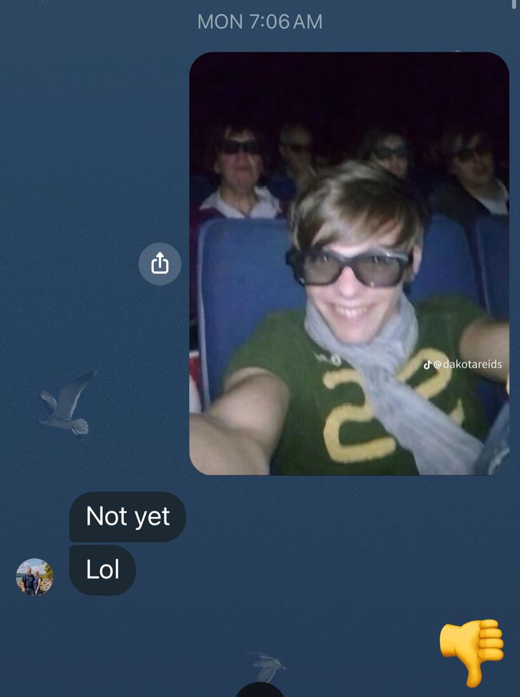 facebook mom selfie photo of twink louis tomlinson in a movie theater wearing 3D glasses and smiling 