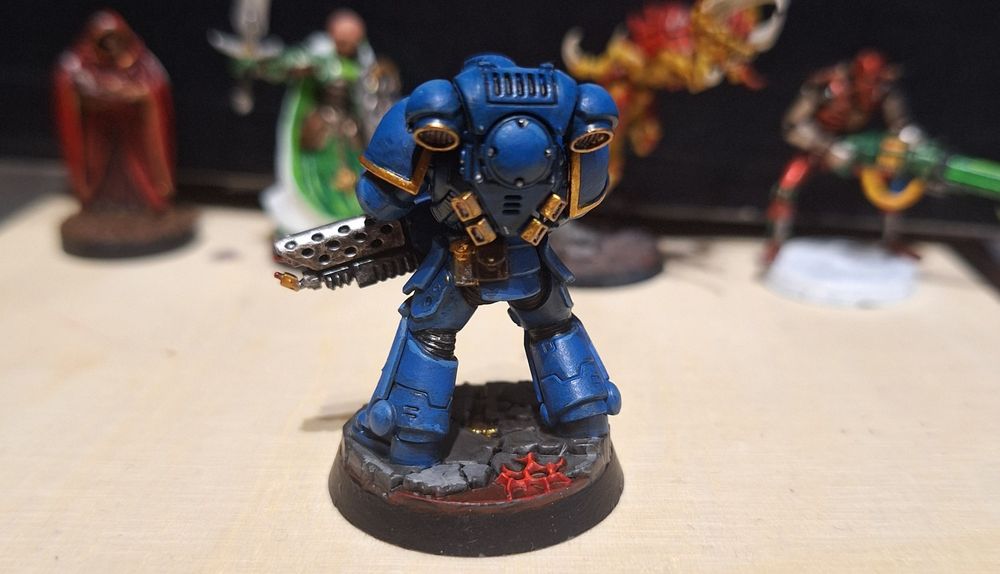 Same image as before but with the flash off. Idk I don't photograph my minis often. My phone can just about get the whole thing in focus.