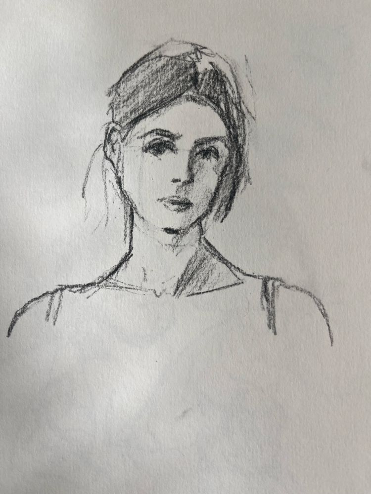 Charcoal sketch of a young woman’s head and shoulders 